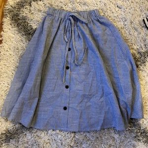 Mid length white and blue striped skirt
